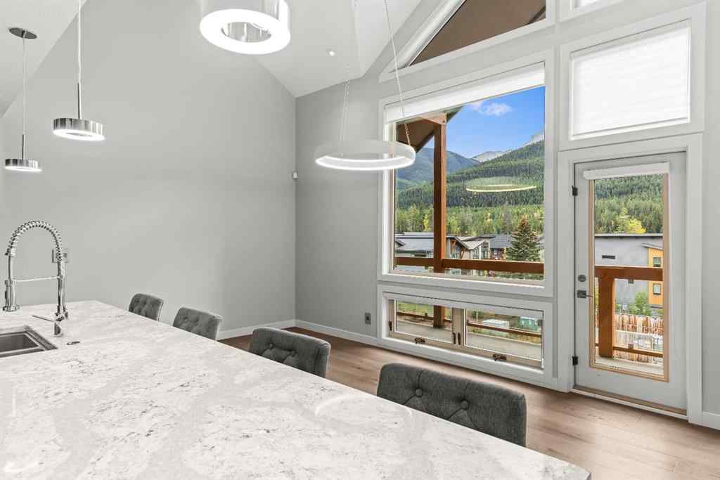 MLS® A2262139 - Unit #204 105 Stewart Creek Rise SW in Three Sisters Canmore, Residential