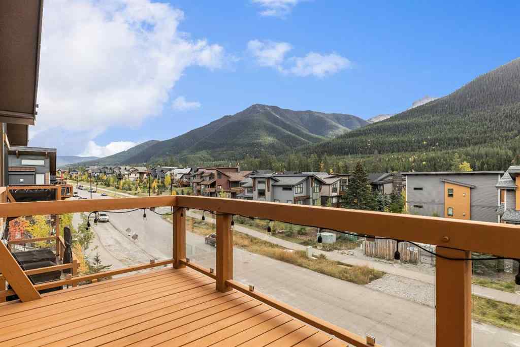 MLS® A2262139 - Unit #204 105 Stewart Creek Rise SW in Three Sisters Canmore, Residential
