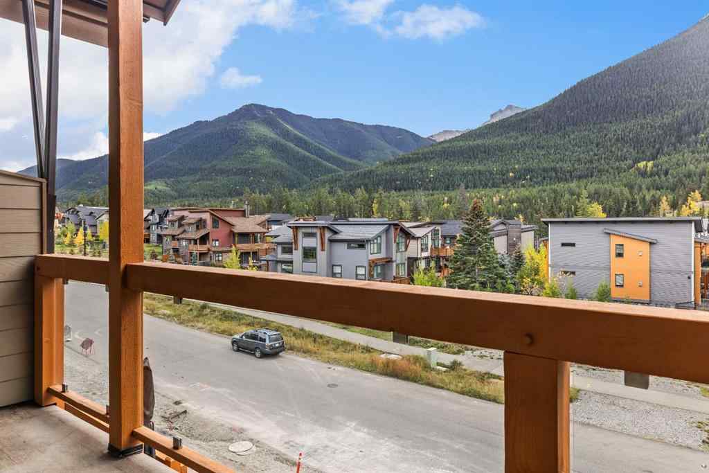 MLS® A2262139 - Unit #204 105 Stewart Creek Rise SW in Three Sisters Canmore, Residential