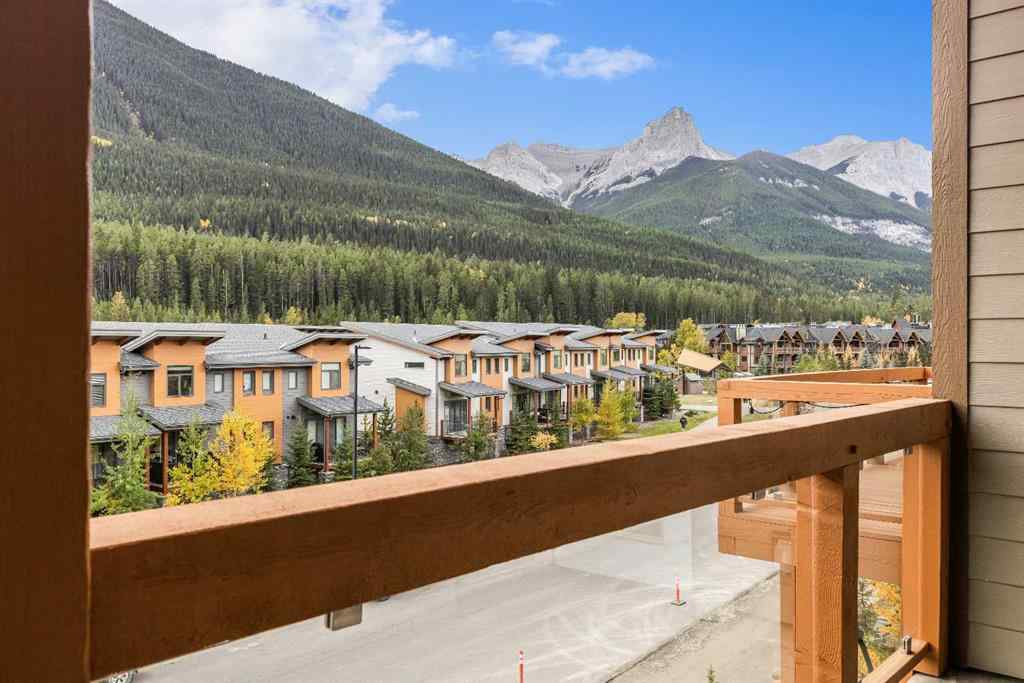 MLS® A2262139 - Unit #204 105 Stewart Creek Rise SW in Three Sisters Canmore, Residential