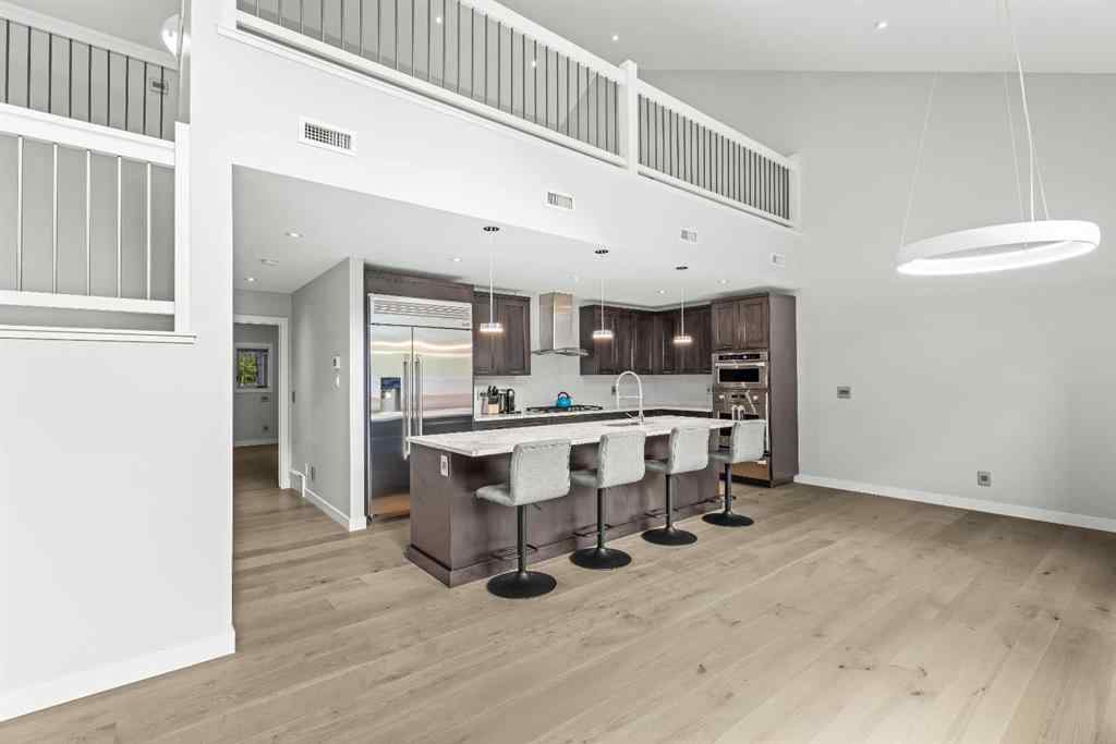 MLS® A2262139 - Unit #204 105 Stewart Creek Rise SW in Three Sisters Canmore, Residential