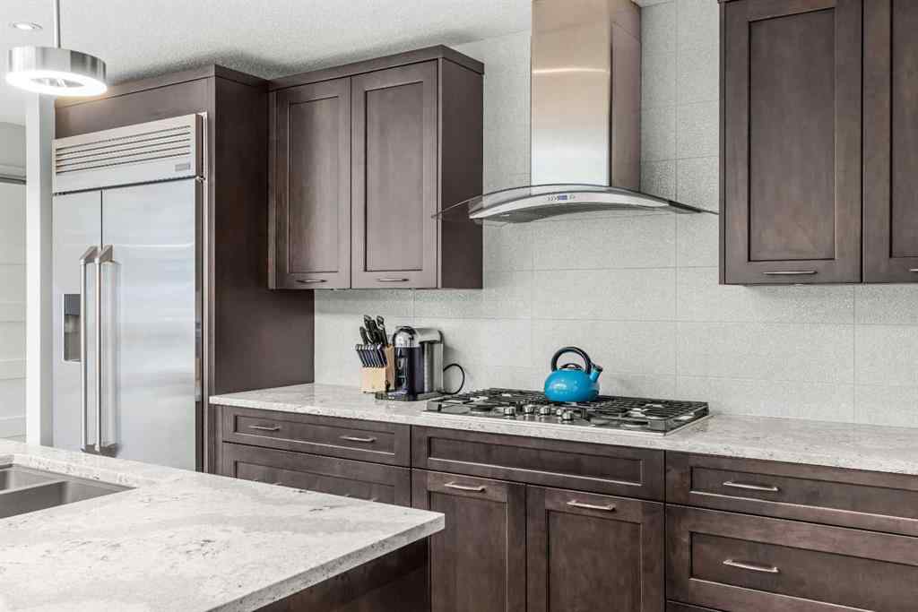 MLS® A2262139 - Unit #204 105 Stewart Creek Rise SW in Three Sisters Canmore, Residential