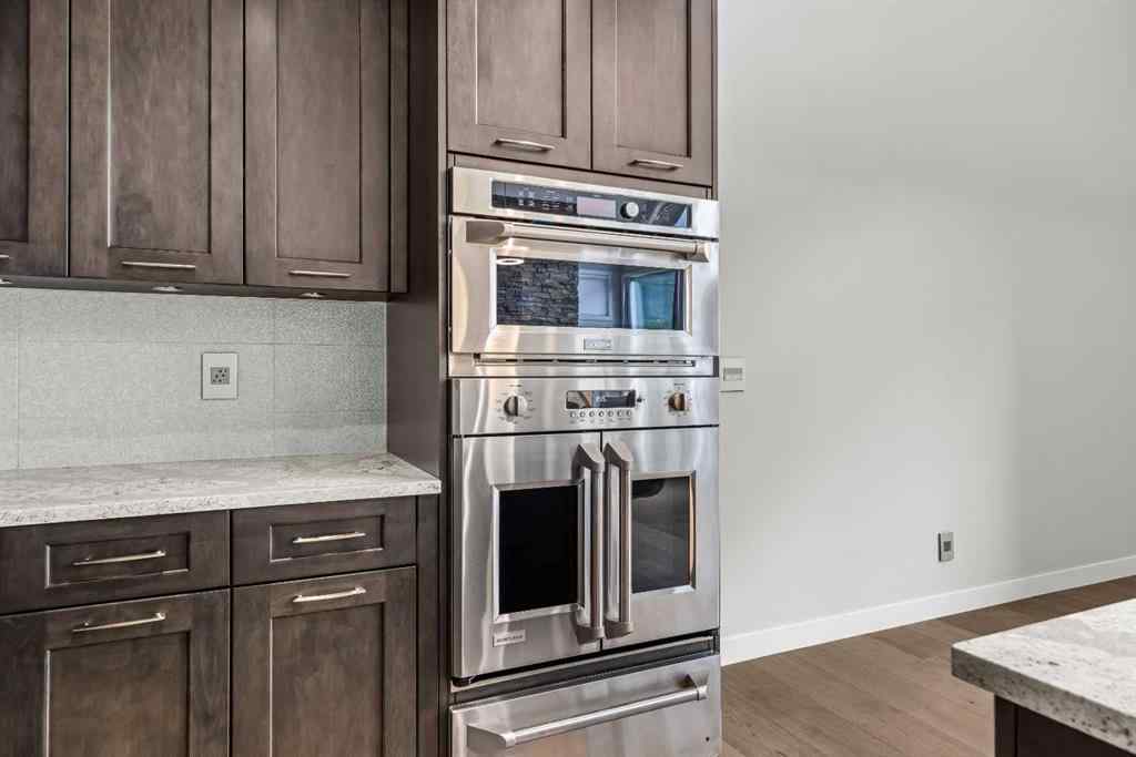 MLS® A2262139 - Unit #204 105 Stewart Creek Rise SW in Three Sisters Canmore, Residential