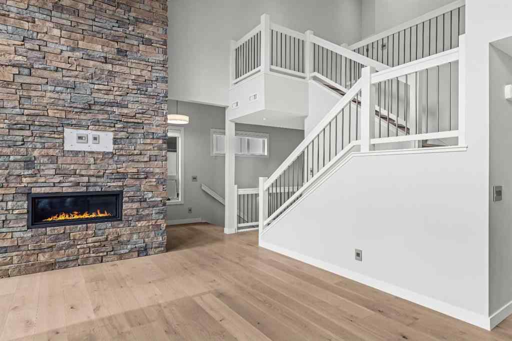 MLS® A2262139 - Unit #204 105 Stewart Creek Rise SW in Three Sisters Canmore, Residential