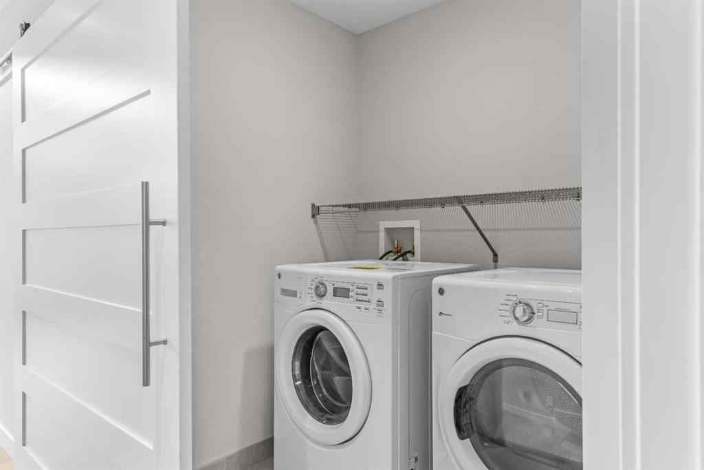 MLS® A2262139 - Unit #204 105 Stewart Creek Rise SW in Three Sisters Canmore, Residential