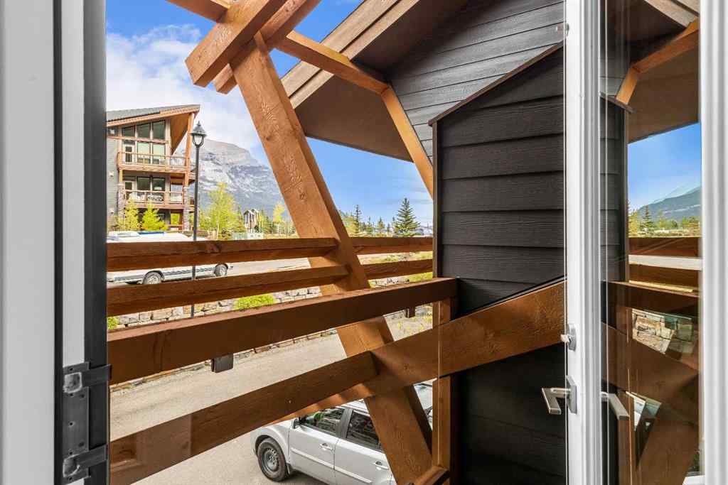 MLS® A2262139 - Unit #204 105 Stewart Creek Rise SW in Three Sisters Canmore, Residential