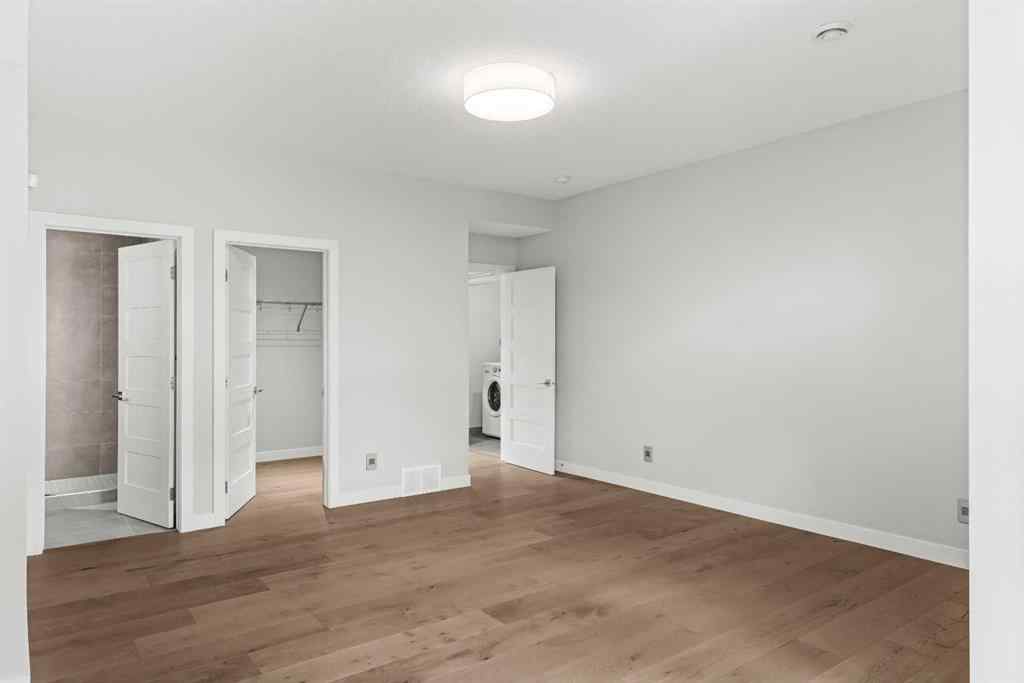 MLS® A2262139 - Unit #204 105 Stewart Creek Rise SW in Three Sisters Canmore, Residential