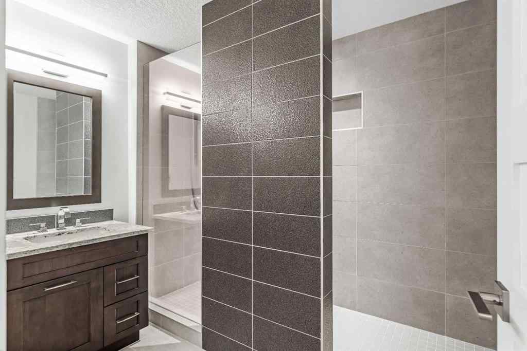 MLS® A2262139 - Unit #204 105 Stewart Creek Rise SW in Three Sisters Canmore, Residential