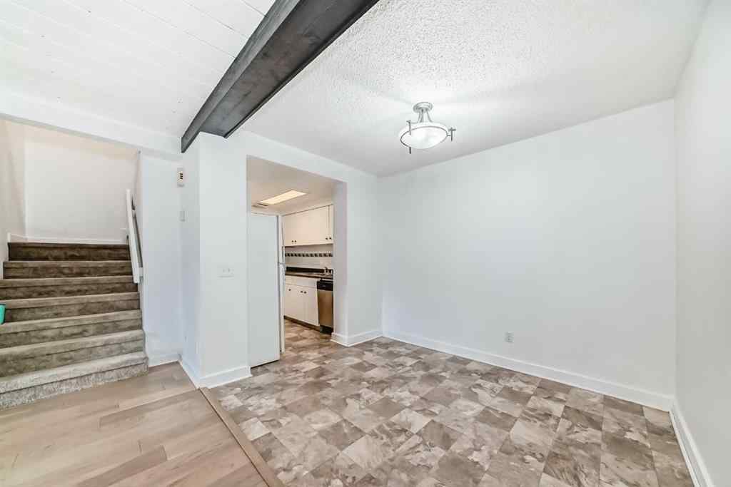 MLS® A2262145 - Unit #112 5404 10 Avenue SE in Penbrooke Meadows Calgary, Residential