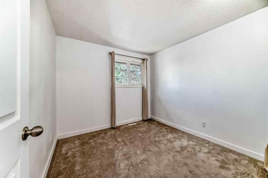 MLS® A2262145 - Unit #112 5404 10 Avenue SE in Penbrooke Meadows Calgary, Residential