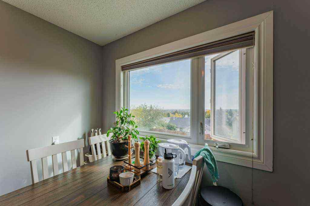 MLS® A2262155 - 14 Macewan Park Road NW in MacEwan Glen Calgary, Residential