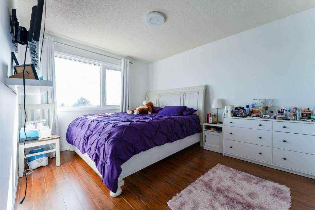 MLS® A2262155 - 14 Macewan Park Road NW in MacEwan Glen Calgary, Residential