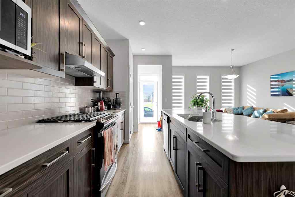 MLS® A2262176 - 103 Dawson Harbour Hill  in Dawson\'s Landing Chestermere, Residential