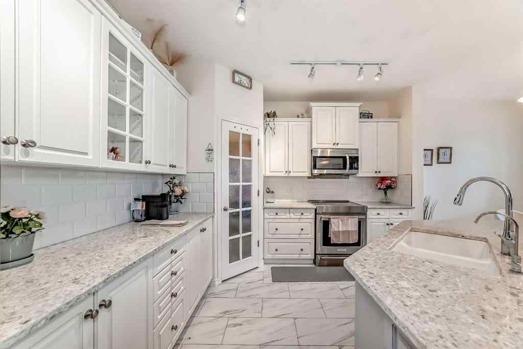 MLS® A2262179 - 82 Mt Gibraltar Heights SE in McKenzie Lake Calgary, Residential