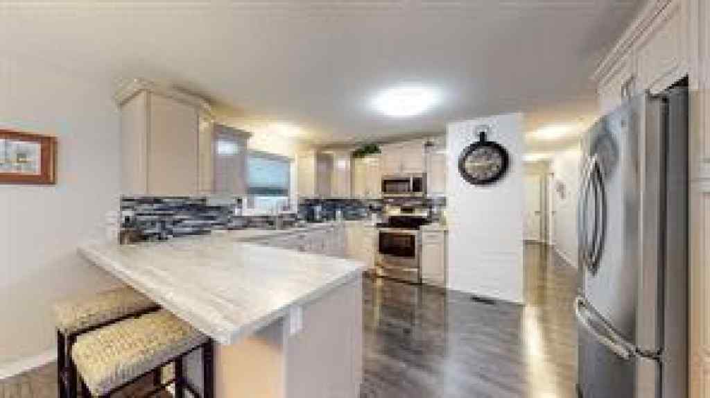 MLS® A2262212 - 211 3 Street NE in Riverside Medicine Hat, Residential