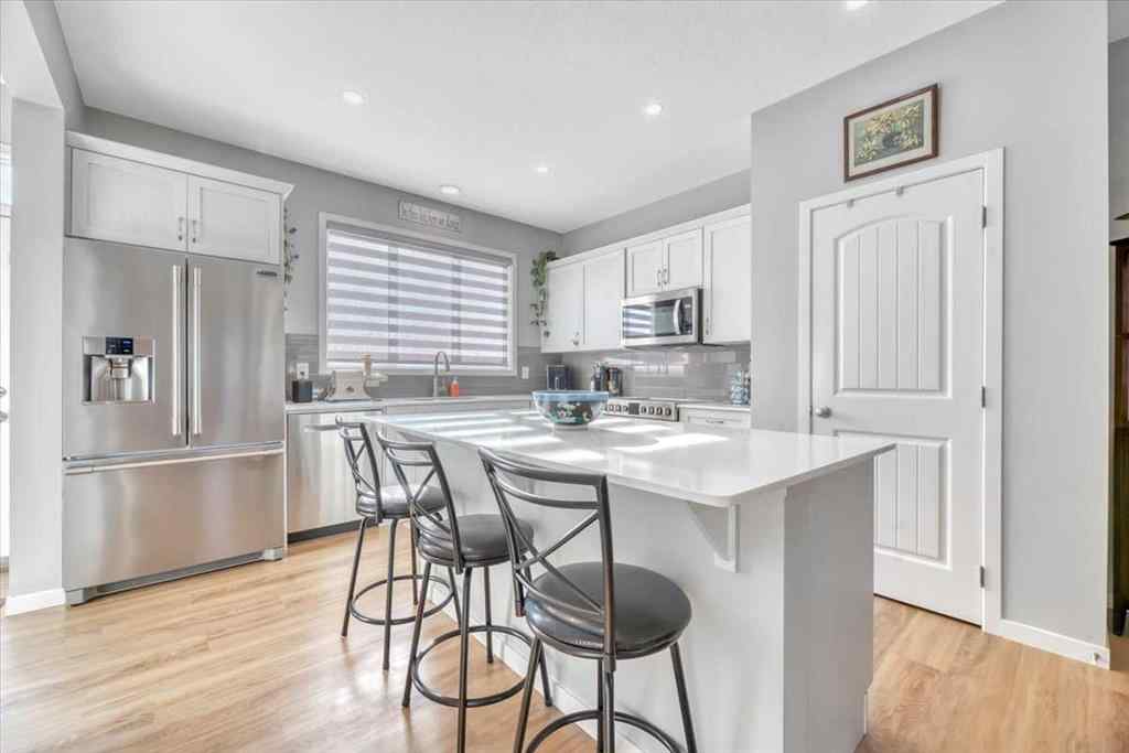 MLS® A2262237 - 21 Juniper Street  in D\'arcy Ranch Okotoks, Residential