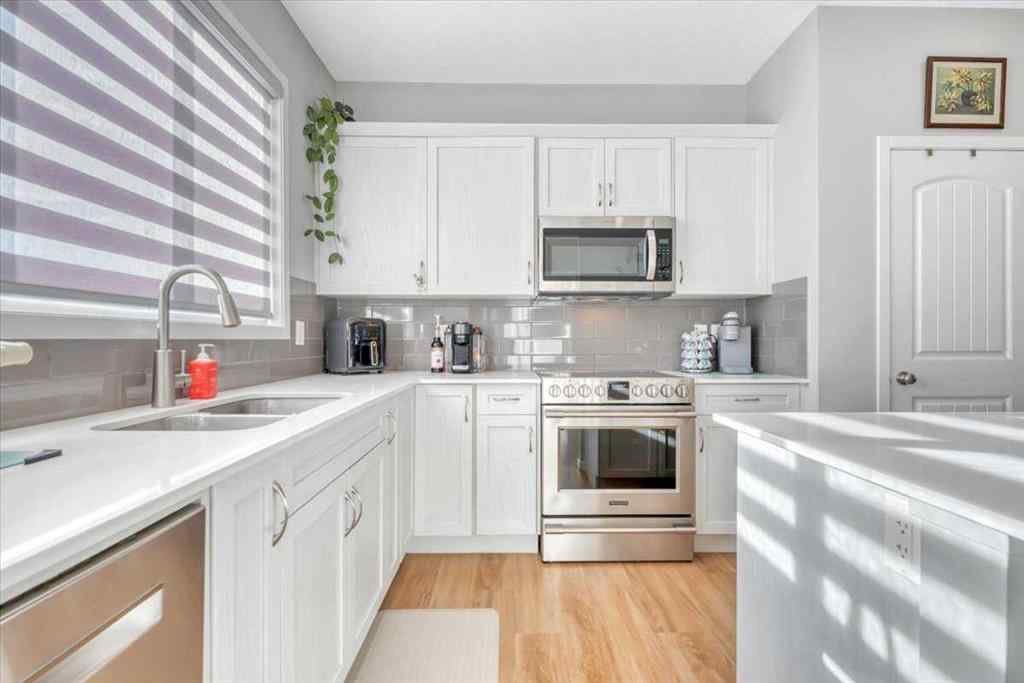 MLS® A2262237 - 21 Juniper Street  in D\'arcy Ranch Okotoks, Residential