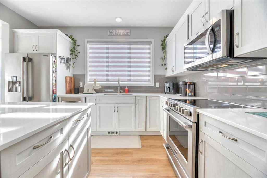 MLS® A2262237 - 21 Juniper Street  in D\'arcy Ranch Okotoks, Residential