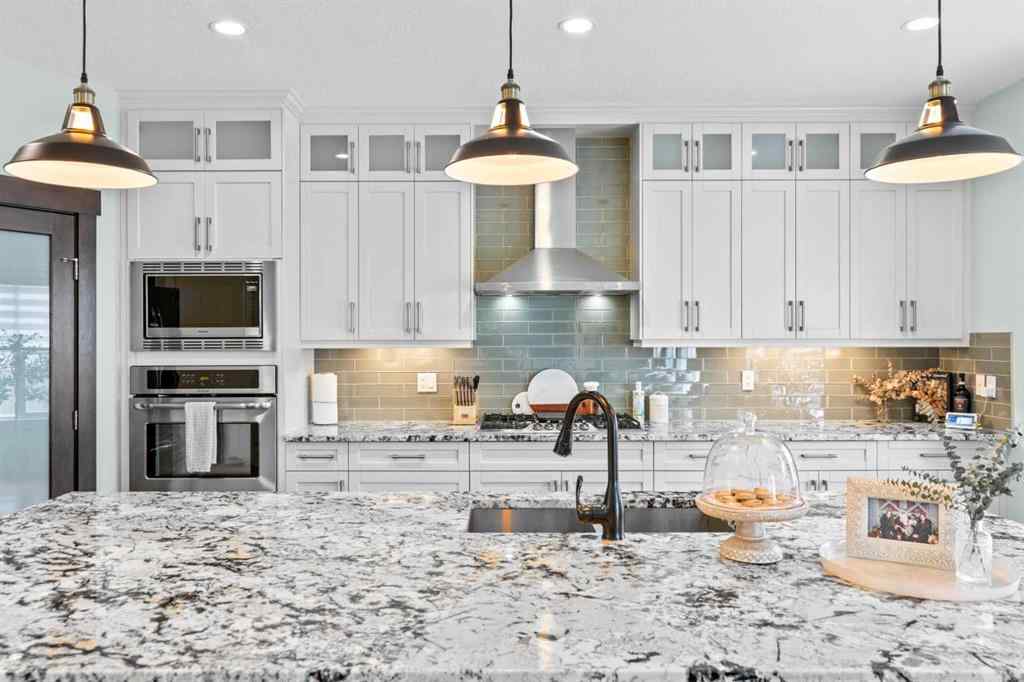 MLS® A2262255 - 148 Baysprings Court SW in Baysprings Airdrie, Residential