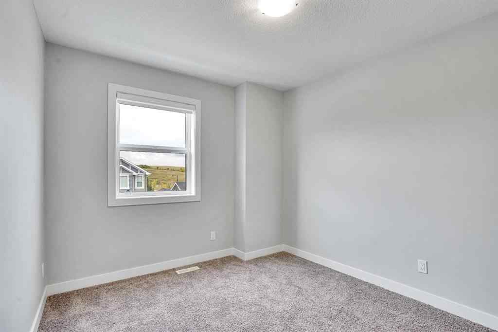 MLS® A2262259 - 114 Crestridge Hill SW in Crestmont Calgary, Residential