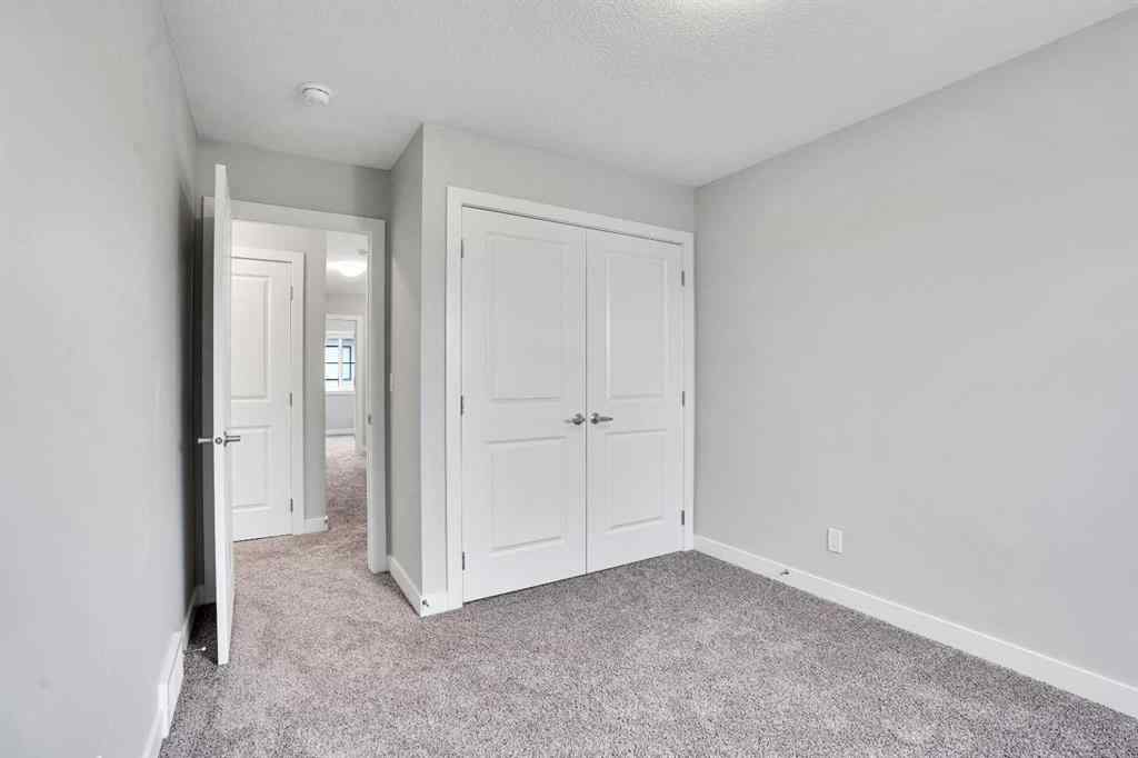 MLS® A2262259 - 114 Crestridge Hill SW in Crestmont Calgary, Residential