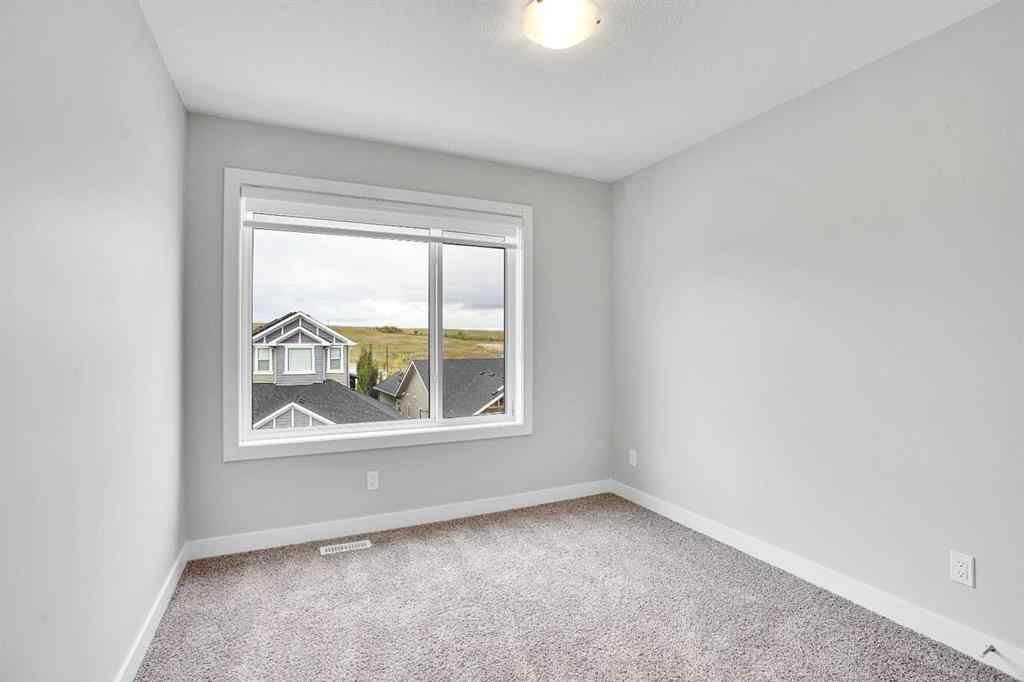 MLS® A2262259 - 114 Crestridge Hill SW in Crestmont Calgary, Residential