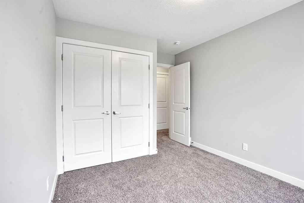 MLS® A2262259 - 114 Crestridge Hill SW in Crestmont Calgary, Residential