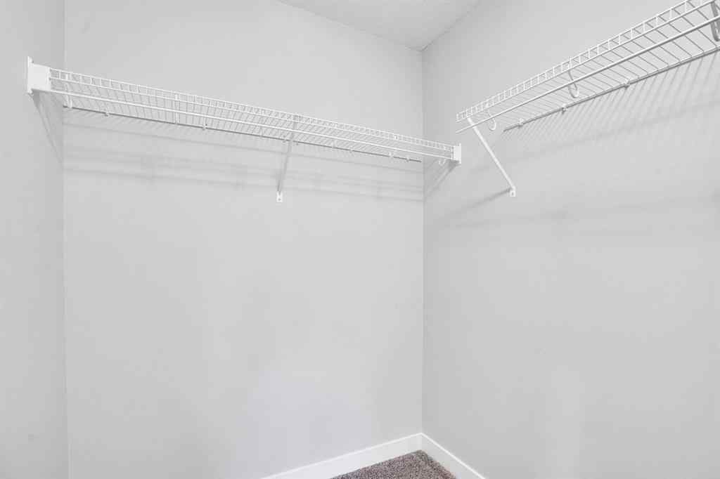 MLS® A2262259 - 114 Crestridge Hill SW in Crestmont Calgary, Residential