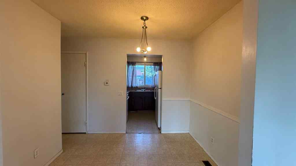 MLS® A2262274 - Unit #55 5425 Pensacola Crescent SE in Penbrooke Meadows Calgary, Residential