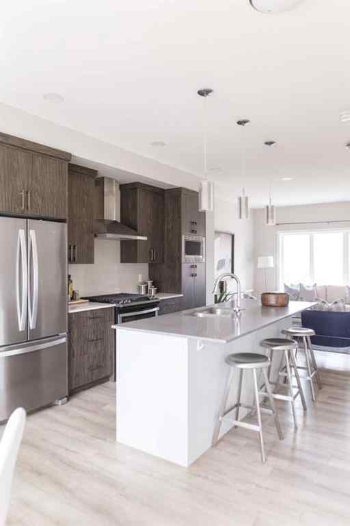 MLS® A2262289 - 25 Sunrise Way  in Sunset Ridge Cochrane, Residential