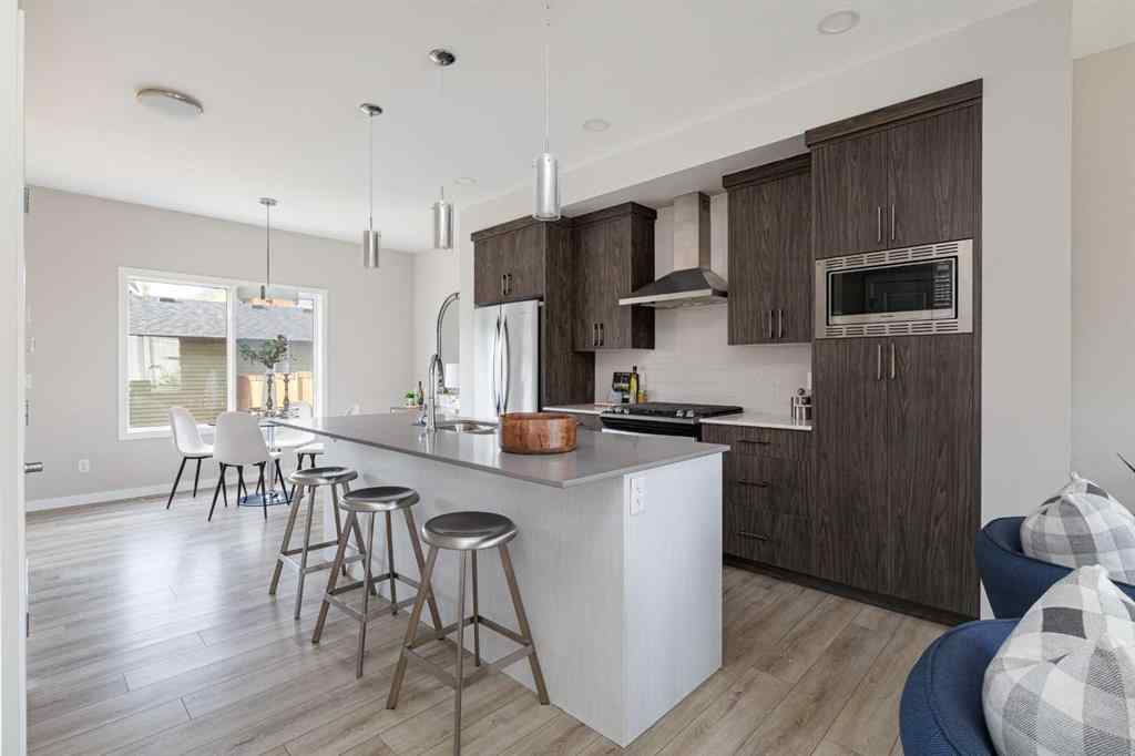 MLS® A2262289 - 25 Sunrise Way  in Sunset Ridge Cochrane, Residential