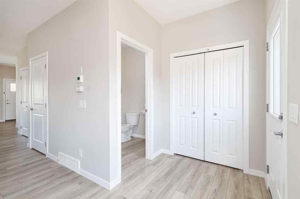 MLS® A2262289 - 25 Sunrise Way  in Sunset Ridge Cochrane, Residential