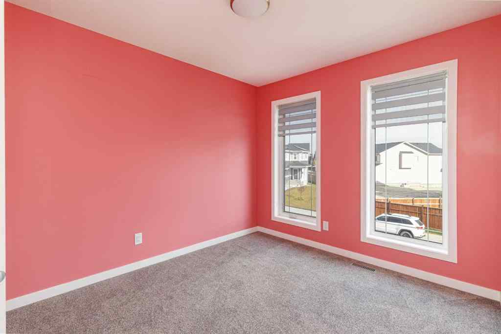 MLS® A2262289 - 25 Sunrise Way  in Sunset Ridge Cochrane, Residential