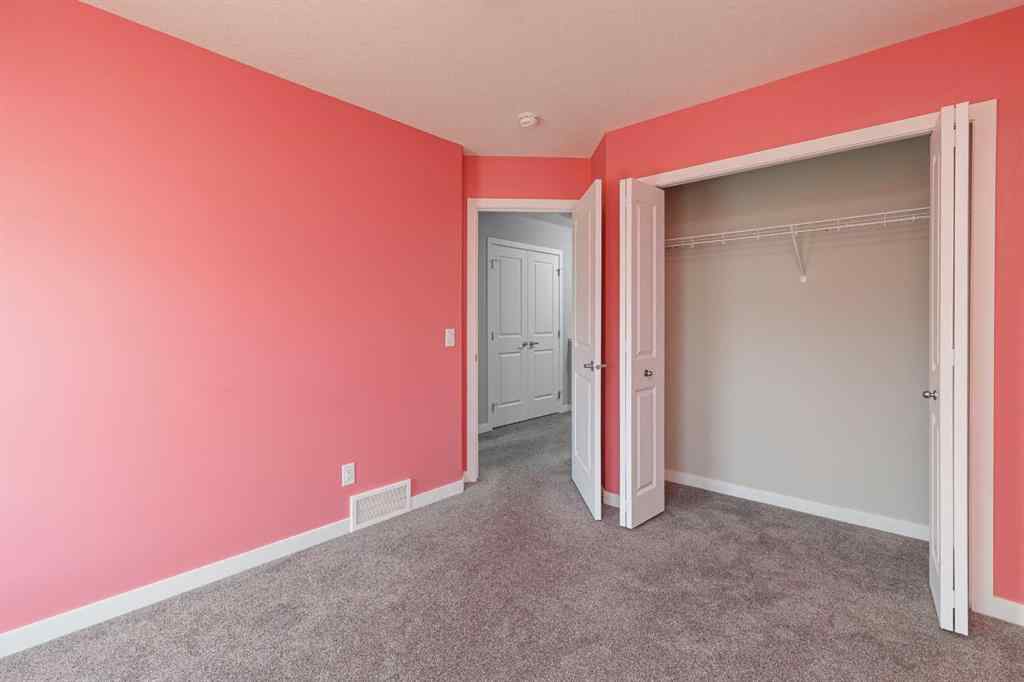 MLS® A2262289 - 25 Sunrise Way  in Sunset Ridge Cochrane, Residential