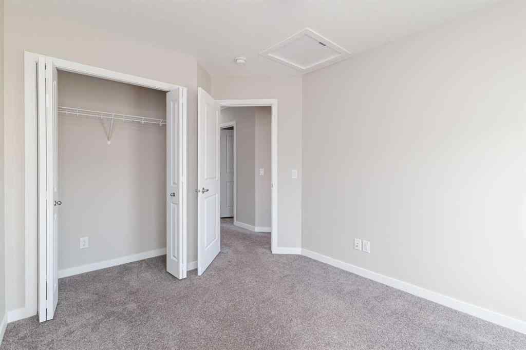 MLS® A2262289 - 25 Sunrise Way  in Sunset Ridge Cochrane, Residential