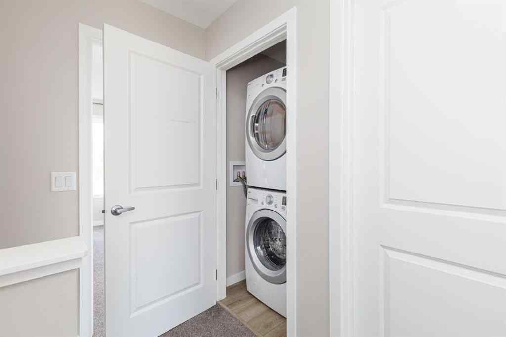 MLS® A2262289 - 25 Sunrise Way  in Sunset Ridge Cochrane, Residential