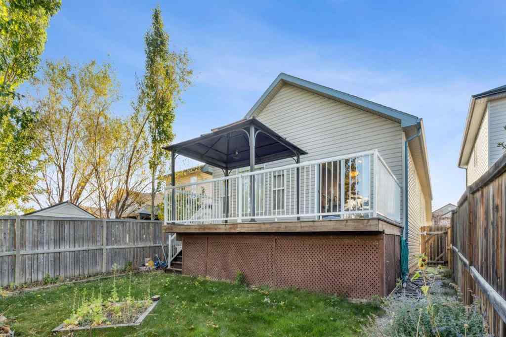 MLS® A2262295 - 1048 Bridlemeadows Manor SW in Bridlewood Calgary, Residential