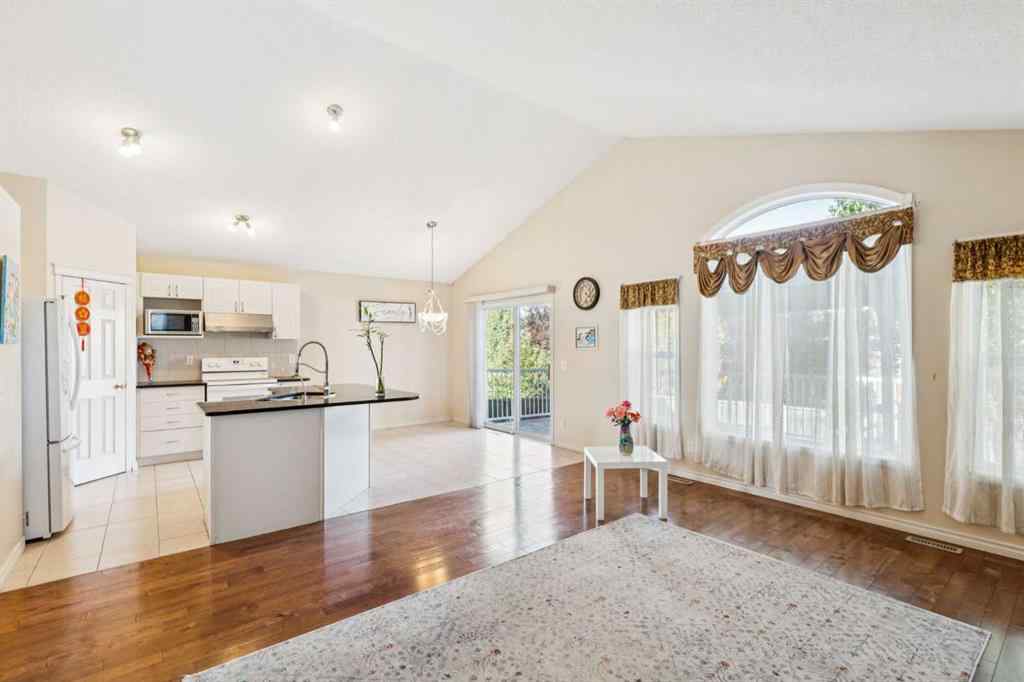 MLS® A2262295 - 1048 Bridlemeadows Manor SW in Bridlewood Calgary, Residential