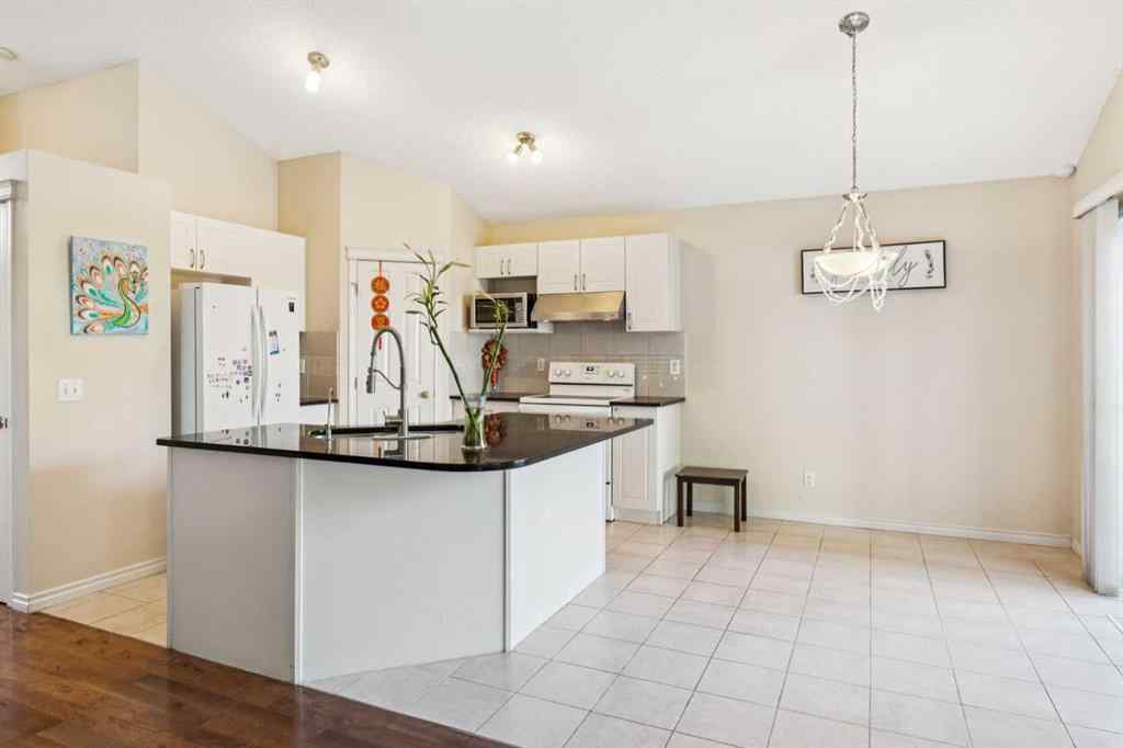 MLS® A2262295 - 1048 Bridlemeadows Manor SW in Bridlewood Calgary, Residential