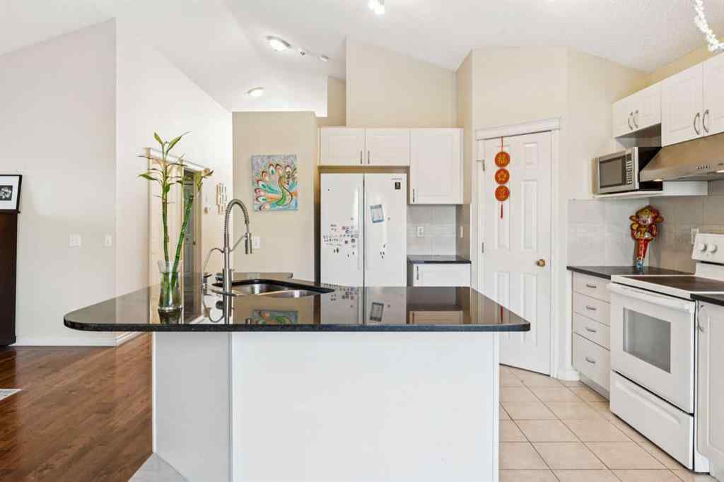 MLS® A2262295 - 1048 Bridlemeadows Manor SW in Bridlewood Calgary, Residential