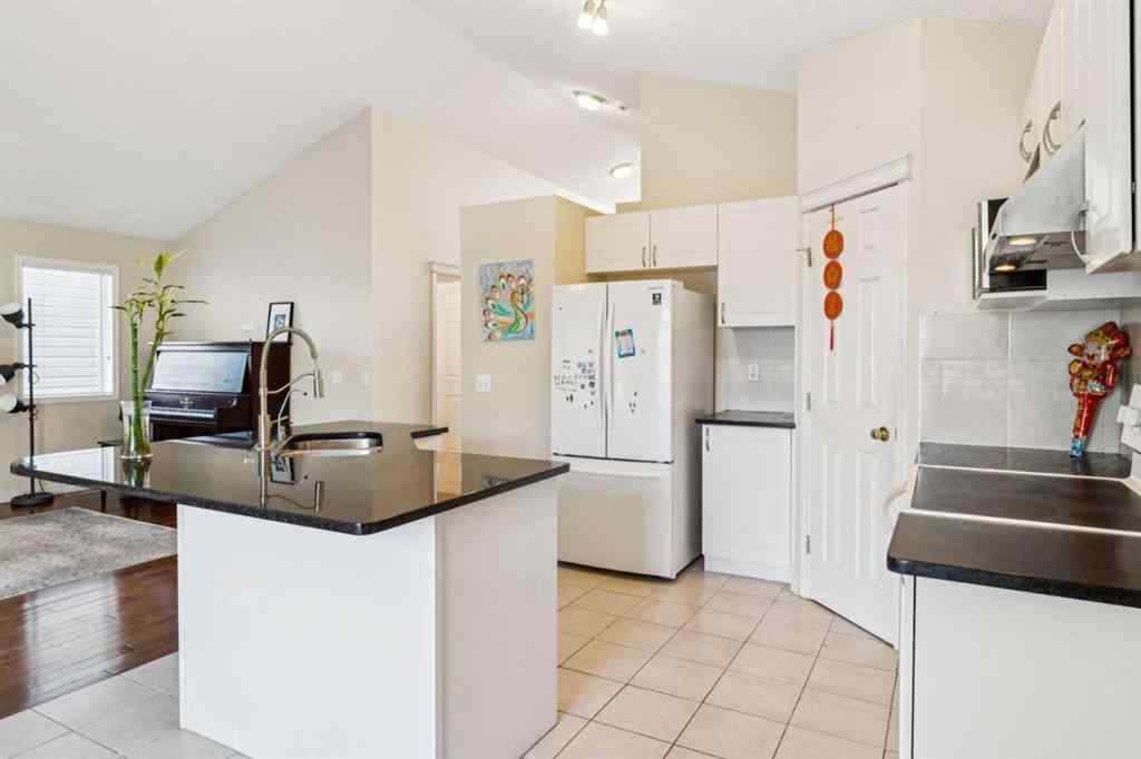 MLS® A2262295 - 1048 Bridlemeadows Manor SW in Bridlewood Calgary, Residential