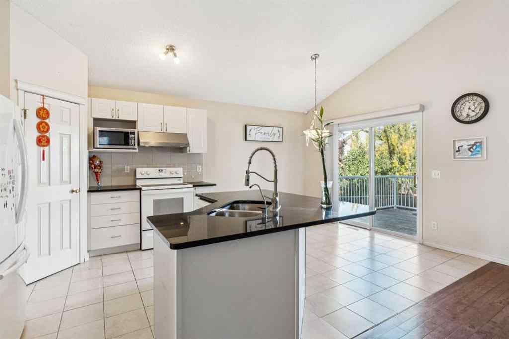 MLS® A2262295 - 1048 Bridlemeadows Manor SW in Bridlewood Calgary, Residential