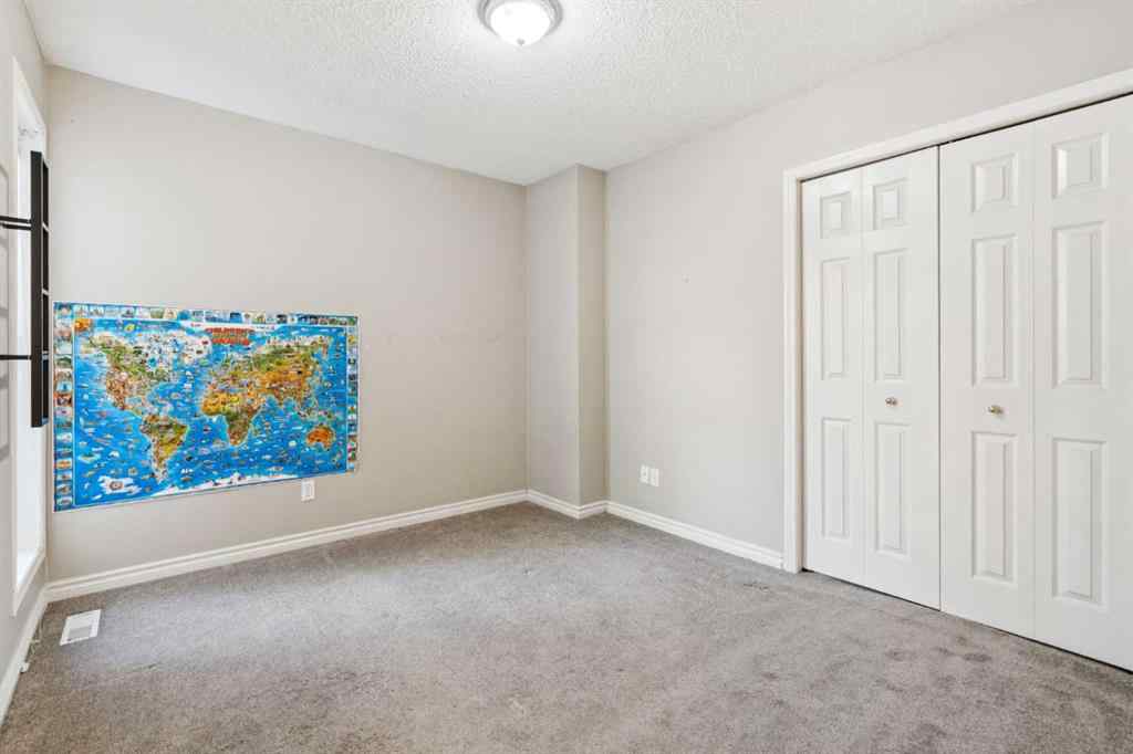 MLS® A2262295 - 1048 Bridlemeadows Manor SW in Bridlewood Calgary, Residential