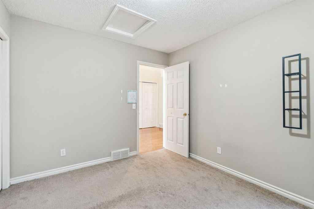 MLS® A2262295 - 1048 Bridlemeadows Manor SW in Bridlewood Calgary, Residential