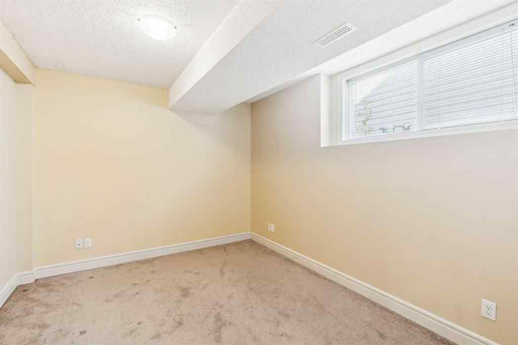 MLS® A2262295 - 1048 Bridlemeadows Manor SW in Bridlewood Calgary, Residential