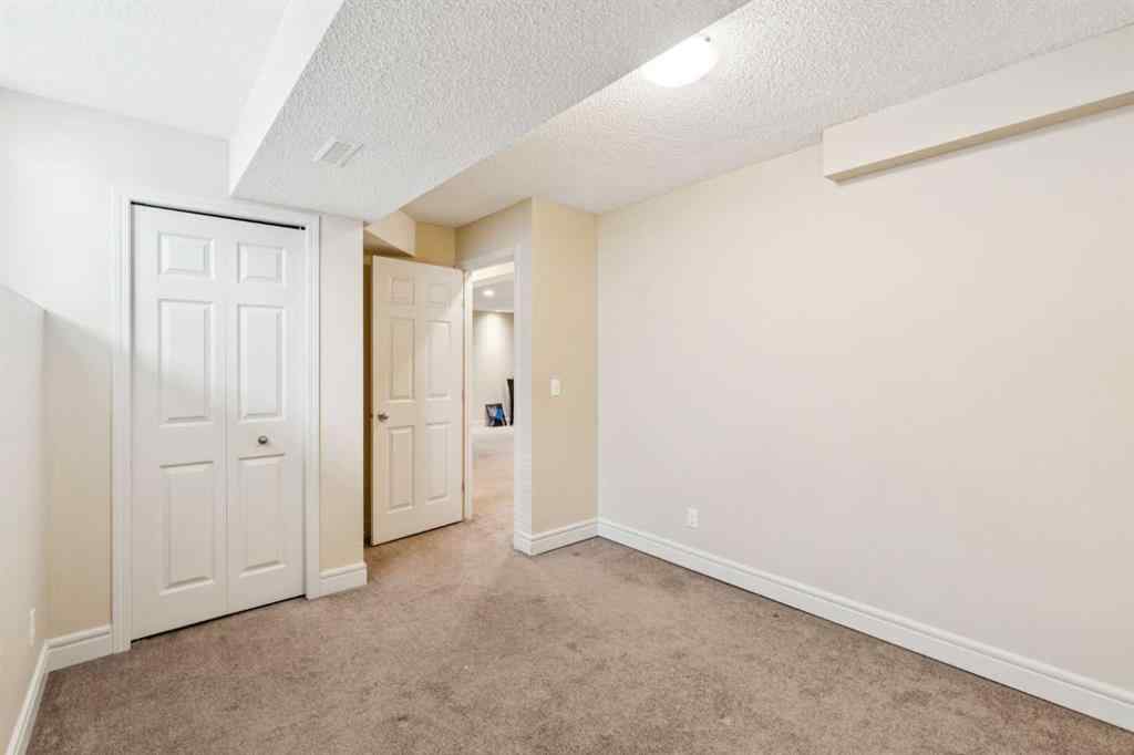 MLS® A2262295 - 1048 Bridlemeadows Manor SW in Bridlewood Calgary, Residential