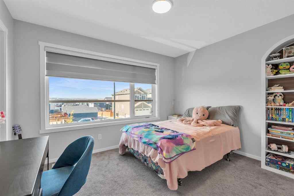 MLS® A2262302 - 98 Lucas Crescent NW in Livingston Calgary, Residential