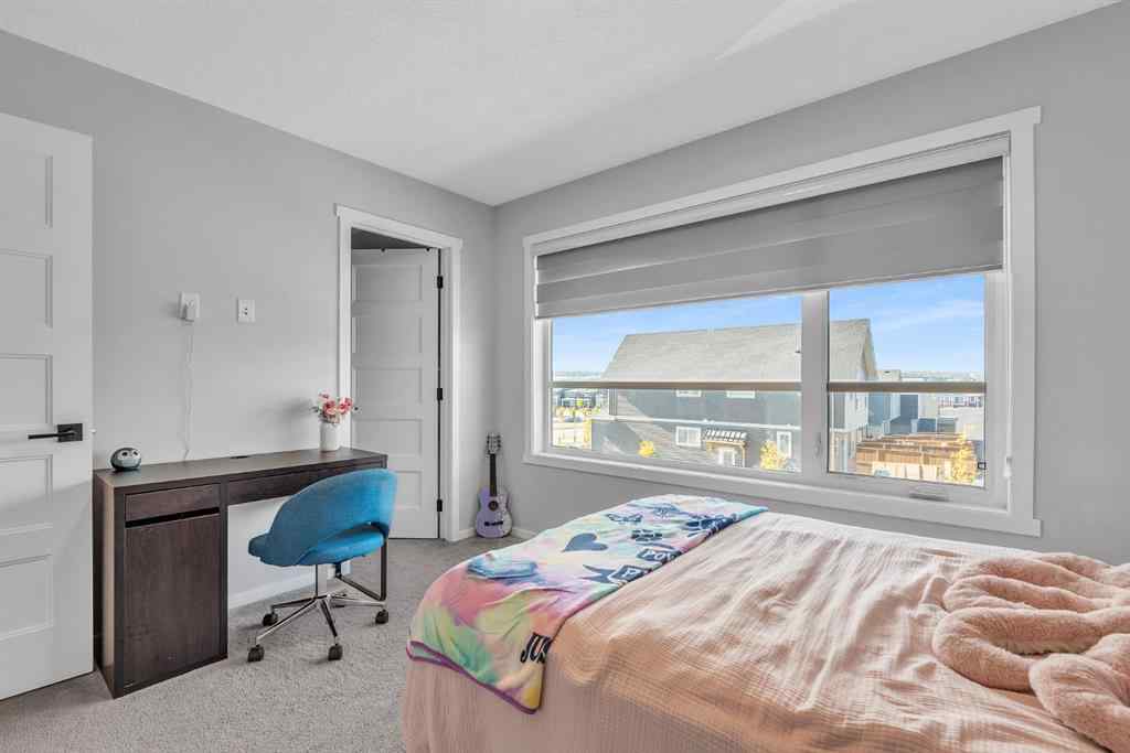 MLS® A2262302 - 98 Lucas Crescent NW in Livingston Calgary, Residential