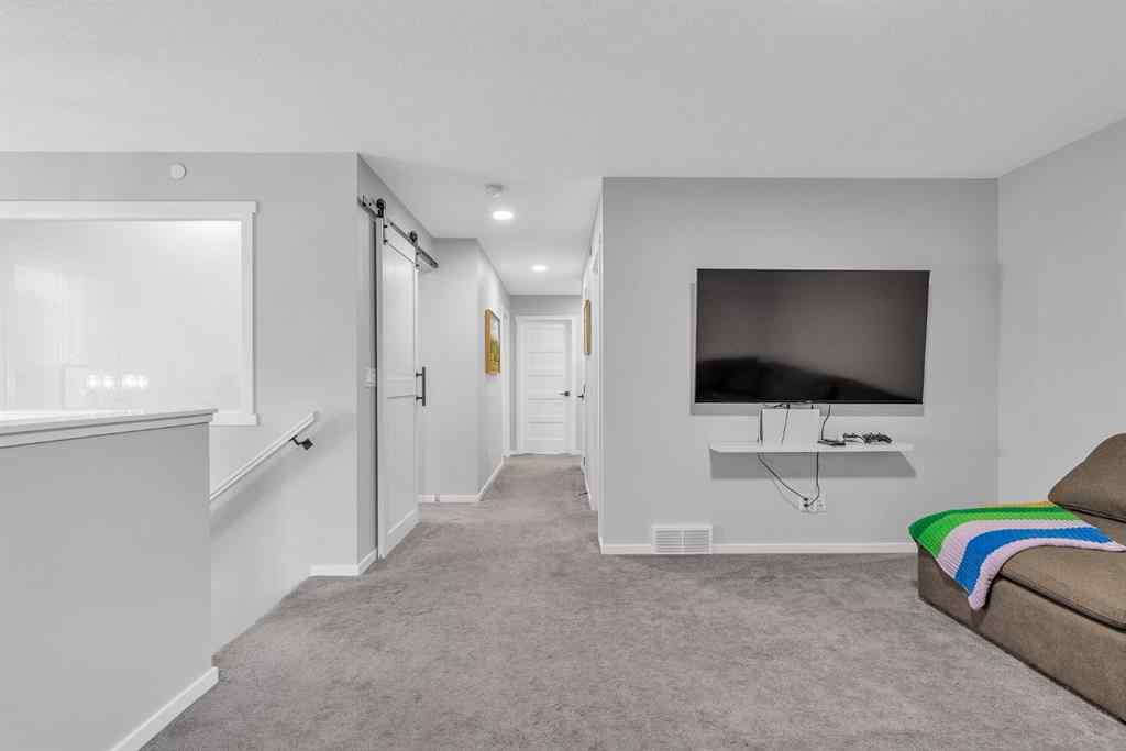 MLS® A2262302 - 98 Lucas Crescent NW in Livingston Calgary, Residential