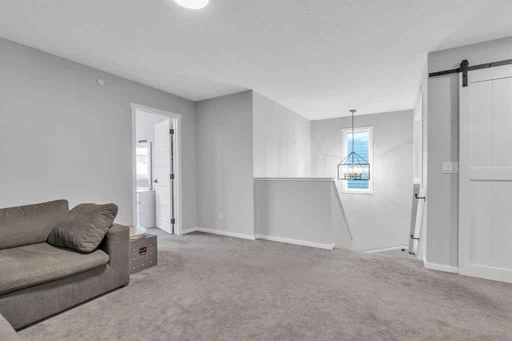 MLS® A2262302 - 98 Lucas Crescent NW in Livingston Calgary, Residential